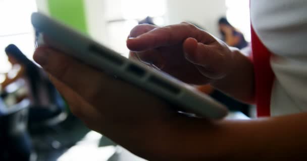 Teacher teaching students on digital tablet — Stock Video