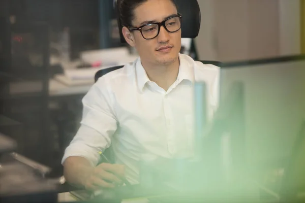 Businessman working in creative office — Stock Photo, Image