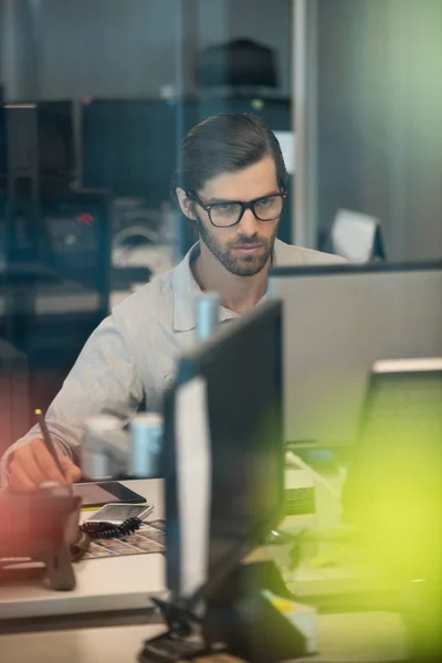 Concentrated businessman working on digitizer — Stock Photo, Image