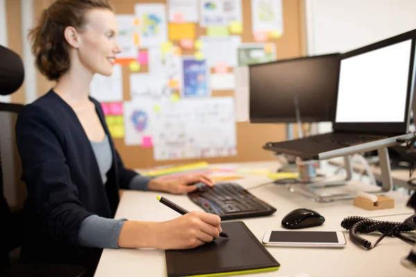 Smiling graphic designer working at office — Stock Photo, Image