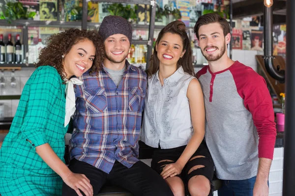 Friends spending leisure time in restaurant — Stock Photo, Image