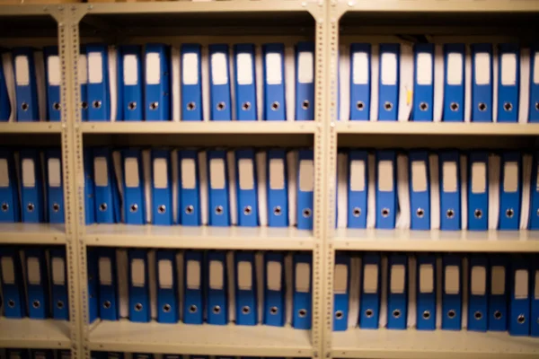 Files arranged on metallic cabinet — Stock Photo, Image