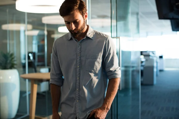 Uphappy businessman looking down — Stock Photo, Image