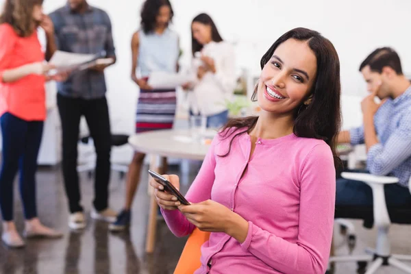 Feliz mujer de negocios con teléfono — Foto de Stock