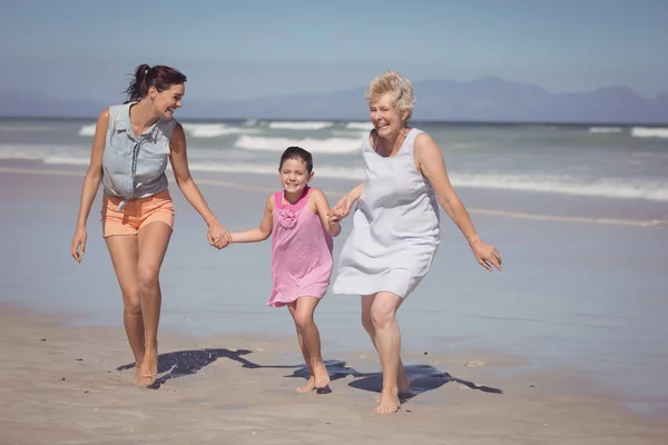 Multi-generation family running — Stock Photo, Image