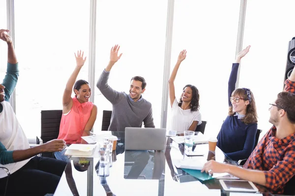 Business people with arms raised — Stock Photo, Image