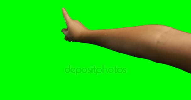 Person making hand gesture against green screen background — Stock Video