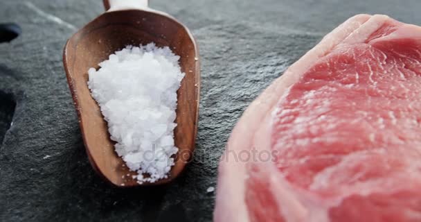 Sirloin chop, salt and chilies — Stock Video