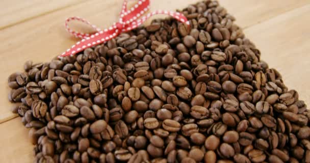 Grains de café torréfiés formant la forme — Video