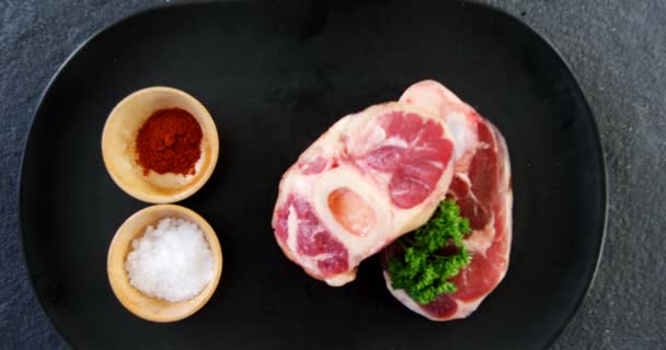 Raw meat chops and ingredients — Stock Video