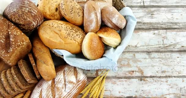 Various bread loaves in basket — Stock Video