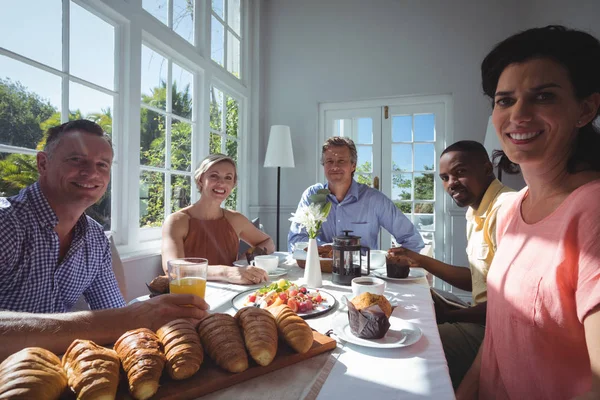 friends while having breakfast