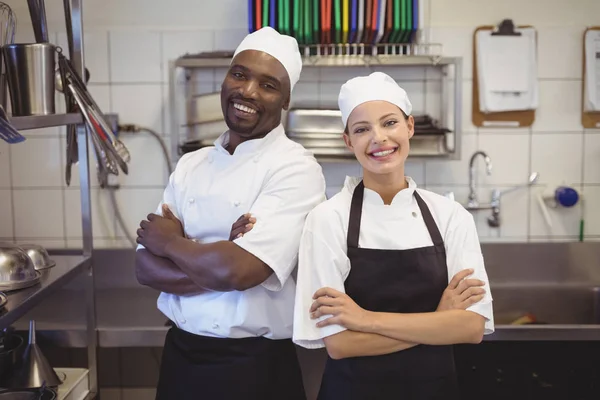 Two chefs standing with arms crossed — Stock Photo, Image