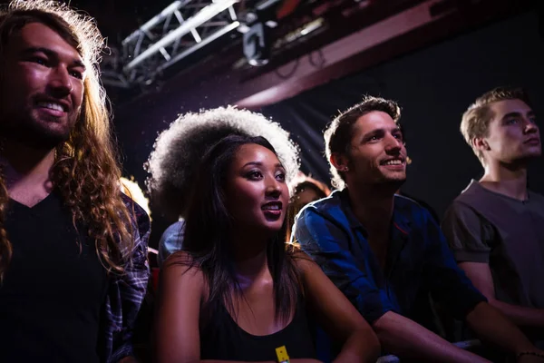 Group of friends watching a rock concert — Stock Photo, Image