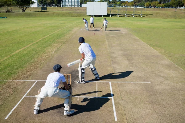 cricket match at field