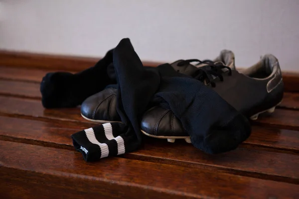 Shoes and socks on bench — Stock Photo, Image