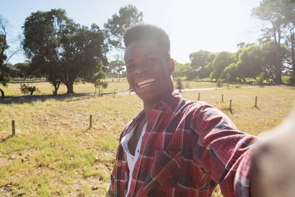 Man standing in park on — Stock Photo, Image