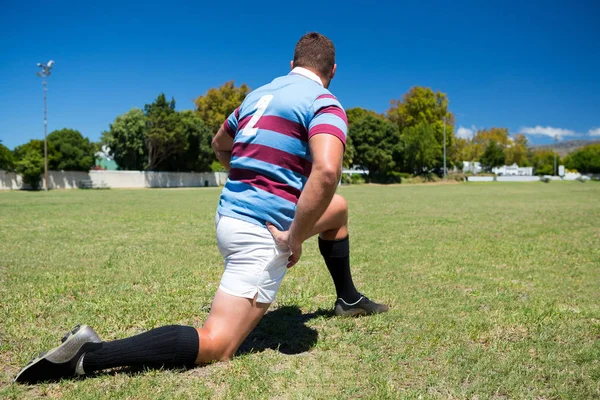 Jogador de rugby exercitando — Fotografia de Stock