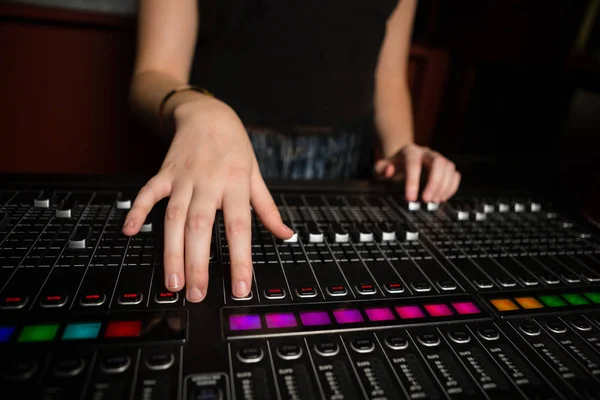 Mid-section of female audio engineer using sound mixer — Stock Photo, Image