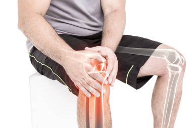 Man holding sore knee clipart