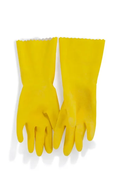 Gele rubberen handschoenen — Stockfoto