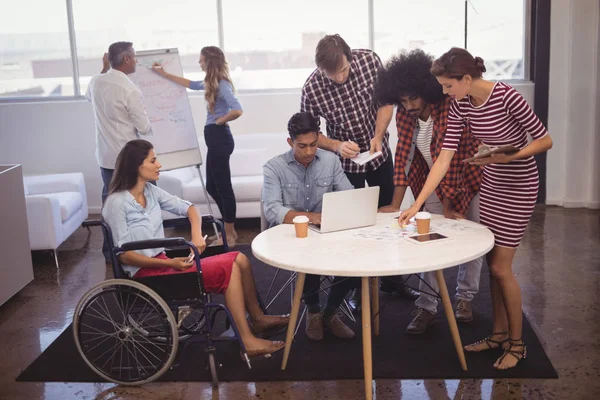 Handicap business people in office — Stock Photo, Image