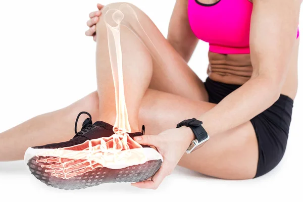 Woman suffering from ankle pain — Stock Photo, Image