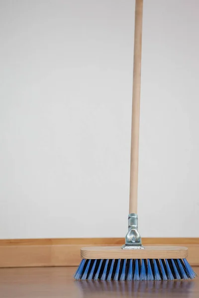 Sweeping broom with wooden handle — Stock Photo, Image