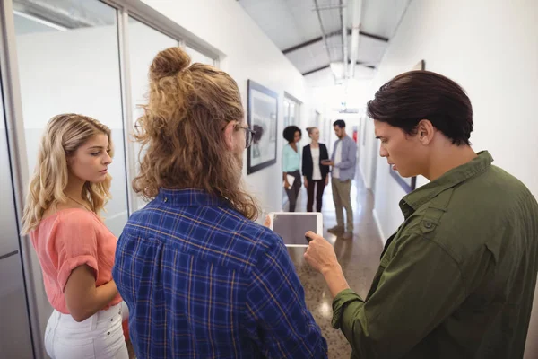 Business people discussing with colleagues — Stock Photo, Image