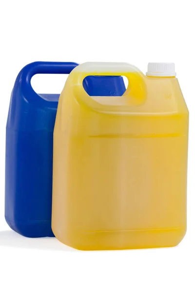 Blauwe en gele wasmiddel containers — Stockfoto