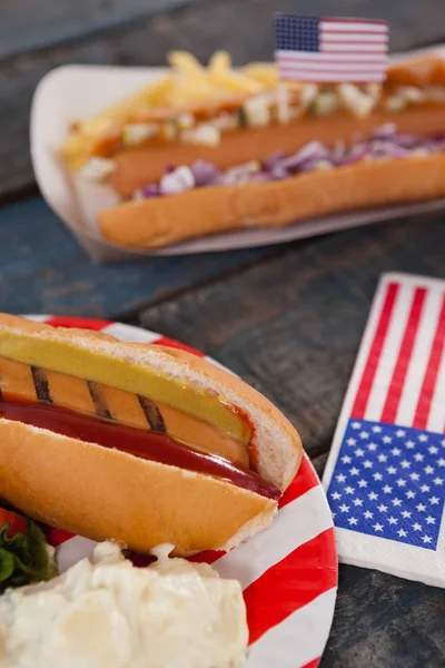 Hot dogs served in plate — Stock Photo, Image