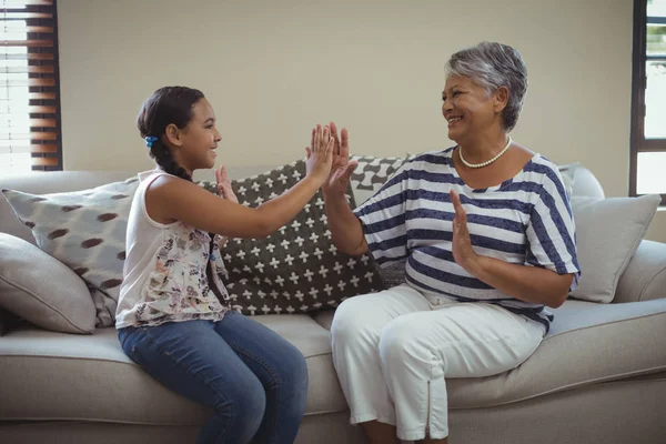 Grandmother and granddaughter having fun — Stock Photo, Image