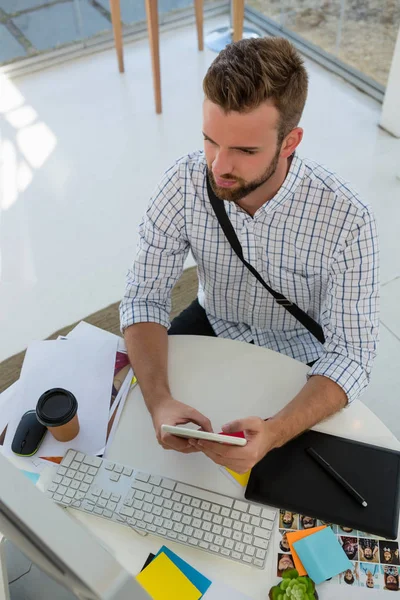 High angle view of graphic designer using tablet computer at desk — Stock Photo, Image