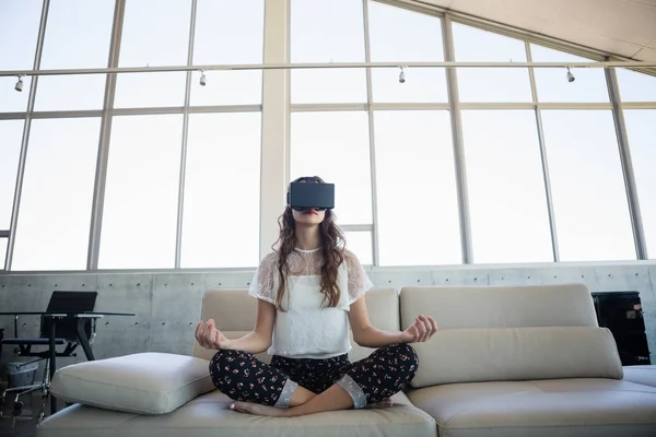 Businesswoman using virtual reality simulator