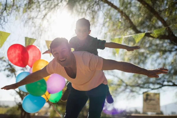 Father and son enjoying together — Stock Photo, Image
