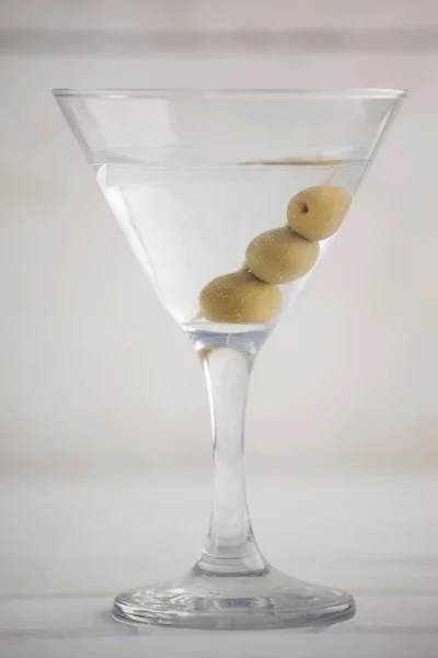 Olives in martini glass — Stock Photo, Image