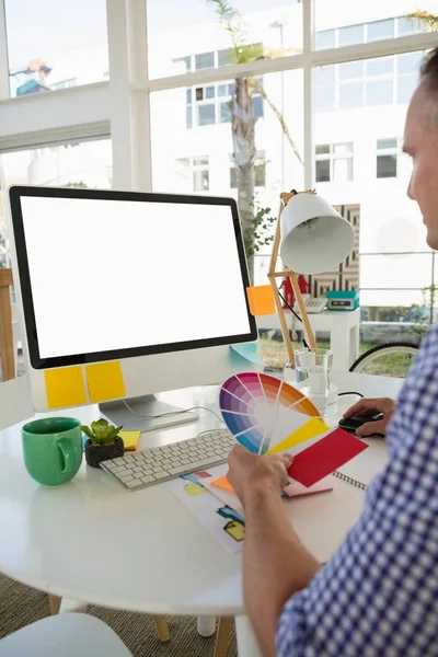 Designer holding color swatch — Stock Photo, Image