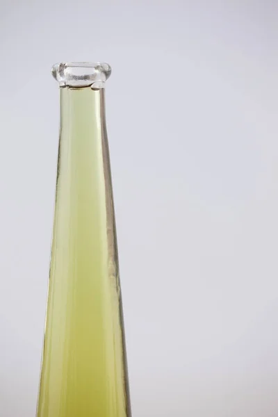 Olive oil in glass bottle — Stock Photo, Image