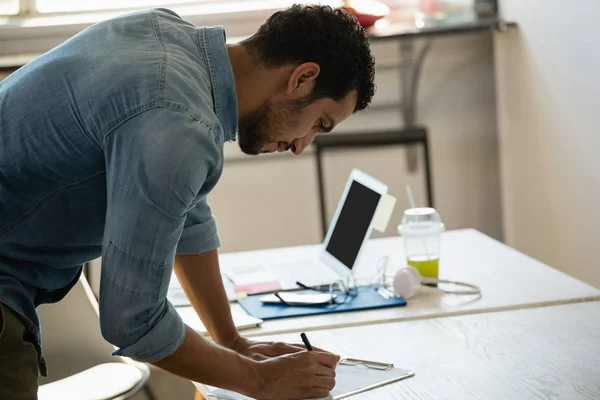 Concentrated man working in office — Stock Photo, Image