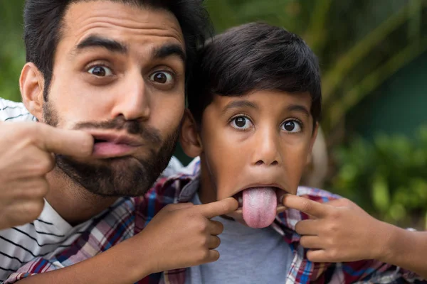 Father and son teasing — Stock Photo, Image