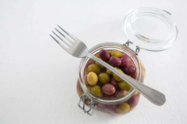 Pickled olives in jar — Stock Photo, Image