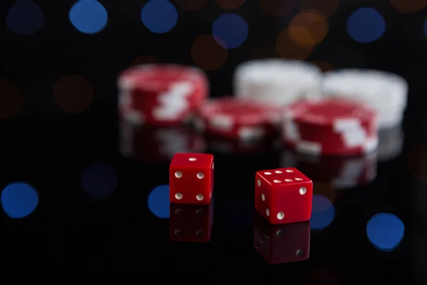 Red dices and casino chips — Stock Photo, Image