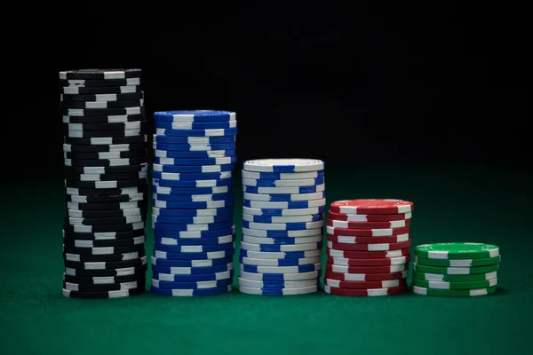 Casino chips arranged in piles — Stock Photo, Image