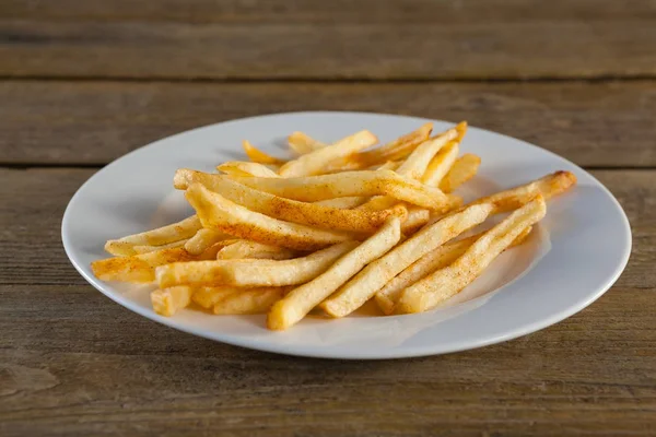 Papas fritas fritas en plato —  Fotos de Stock