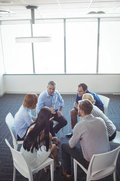 Creative business colleagues interacting — Stock Photo, Image