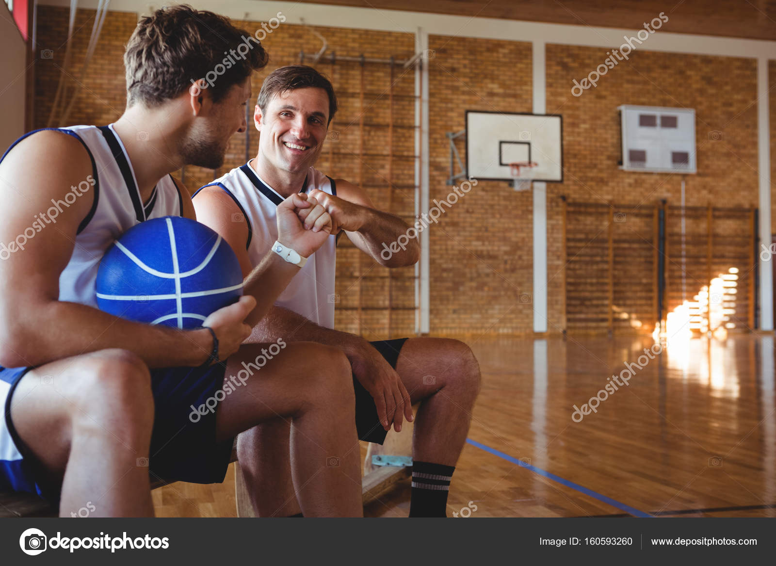Basketball players doing fist bump — Stock Photo © Wavebreakmedia