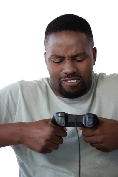 Frustrated man holding joystick — Stock Photo, Image