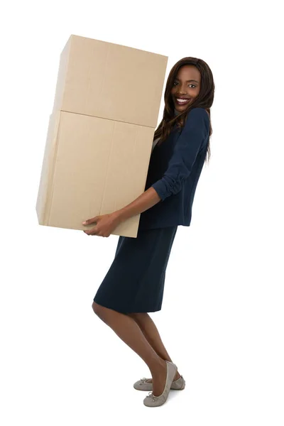 Empresária carregando caixas de papelão — Fotografia de Stock