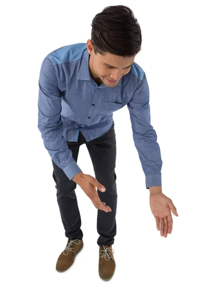 Uomo d'affari gesticolando durante la flessione — Foto Stock