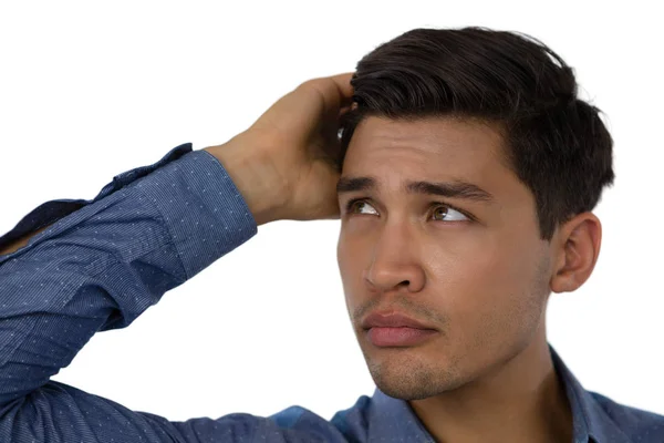 Confused businessman scratching head — Stock Photo, Image